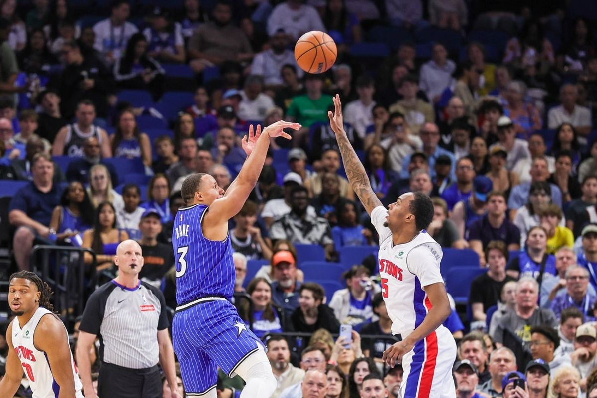 Apr 6, 2026; Orlando, Florida, USA; Orlando Magic guard Desmond Bane (3) shoots over Detroit Pistons forward Ronald Holland II (5) during the second quarter at Kia Center. Mandatory Credit: Mike Watters-Imagn Images