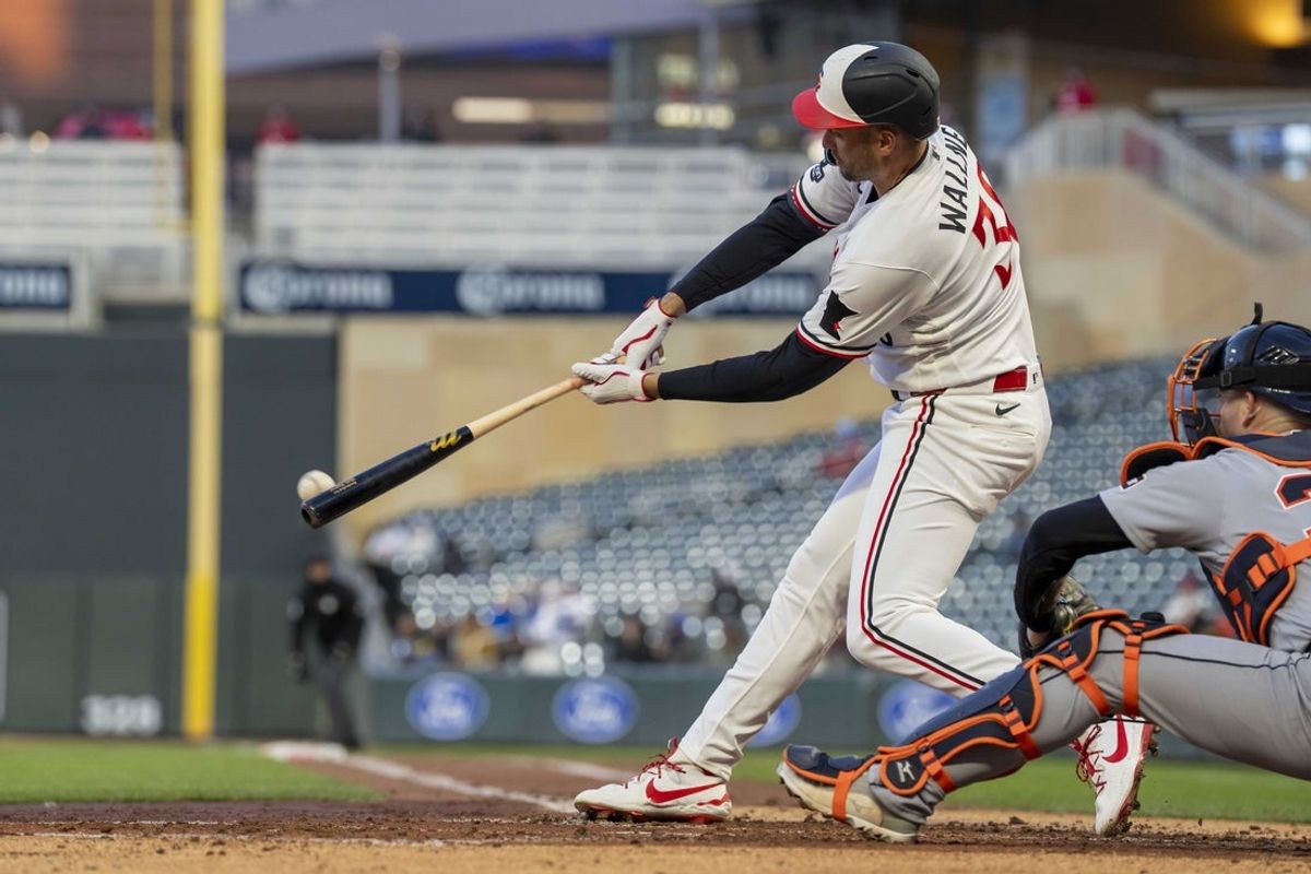 Apr 6, 2026; Minneapolis, Minnesota, USA; Minnesota Twins right fielder Matt Wallner (38) hits an RBI single against the Detroit Tigers in the third inning at Target Field. Mandatory Credit: Jesse Johnson-Imagn Images