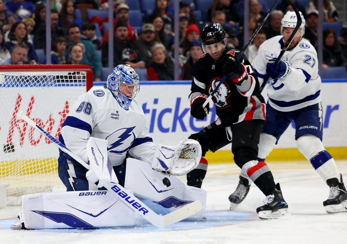 Apr 6, 2026; Buffalo, New York, USA;  Buffalo Sabres left wing Jason Zucker (17) watches as Tampa Bay Lightning goaltender Andrei Vasilevskiy (88) makes a save during the second period at KeyBank Center. Mandatory Credit: Timothy T. Ludwig-Imagn Images