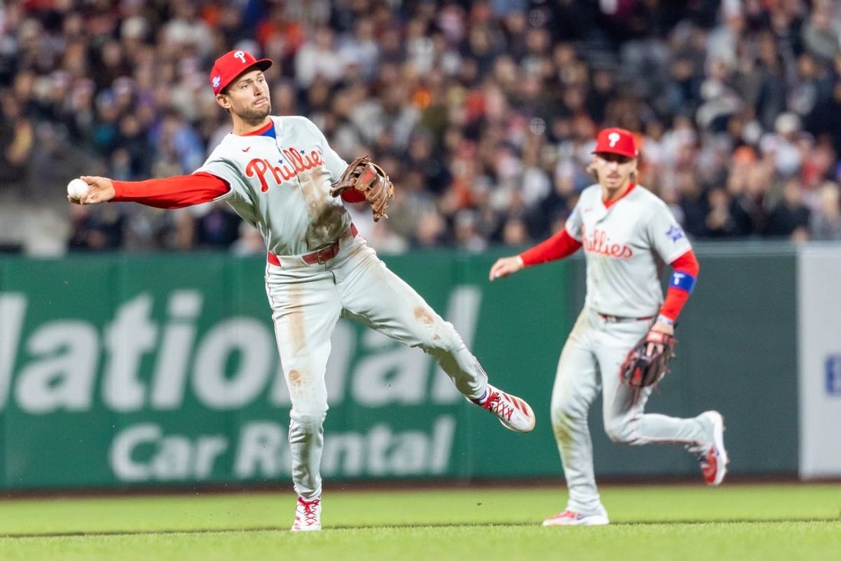 Apr 6, 2026; San Francisco, California, USA; Philadelphia Phillies shortstop Trea Turner (7) throws to first for an out during the fourth inning against the San Francisco Giants at Oracle Park. Mandatory Credit: Bob Kupbens-Imagn Images