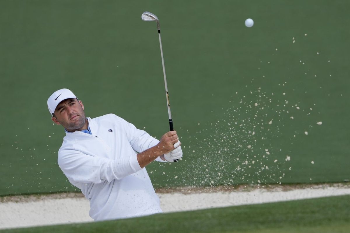Apr 7, 2026; Augusta, Georgia, USA; Scottie Scheffler hits onto the no. 2 green during a practice round for the Masters Tournament at Augusta National Golf Club. Mandatory Credit: Kyle Terada-Imagn Images