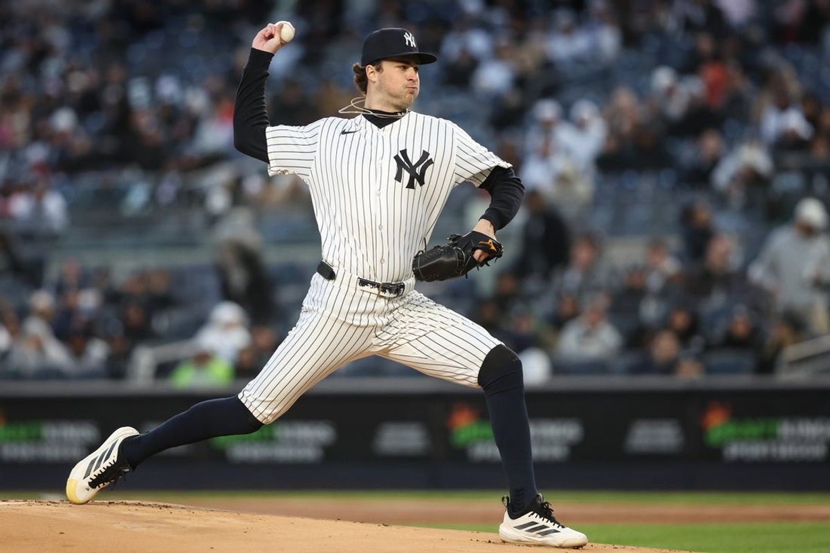 Apr 7, 2026; Bronx, New York, USA;  New York Yankees starting pitcher Cam Schlittler (31) pitches in the first inning against the Athletics at Yankee Stadium. Mandatory Credit: Wendell Cruz-Imagn Images