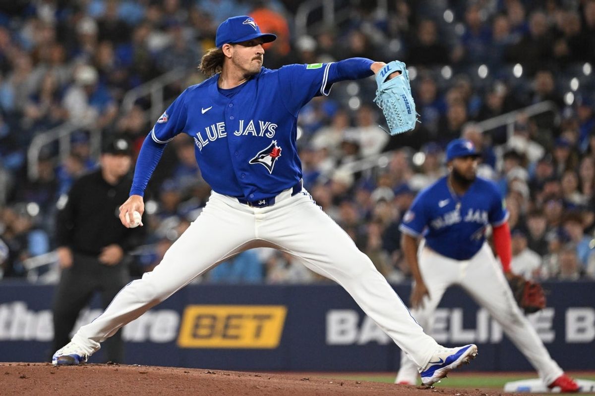Apr 7, 2026; Toronto, Ontario, CAN;  Toronto Blue Jays starting pitcher Kevin Gausman (34) delivers a pitch against the Los Angeles Dodgers in the first inning at Rogers Centre. Mandatory Credit: Dan Hamilton-Imagn Images