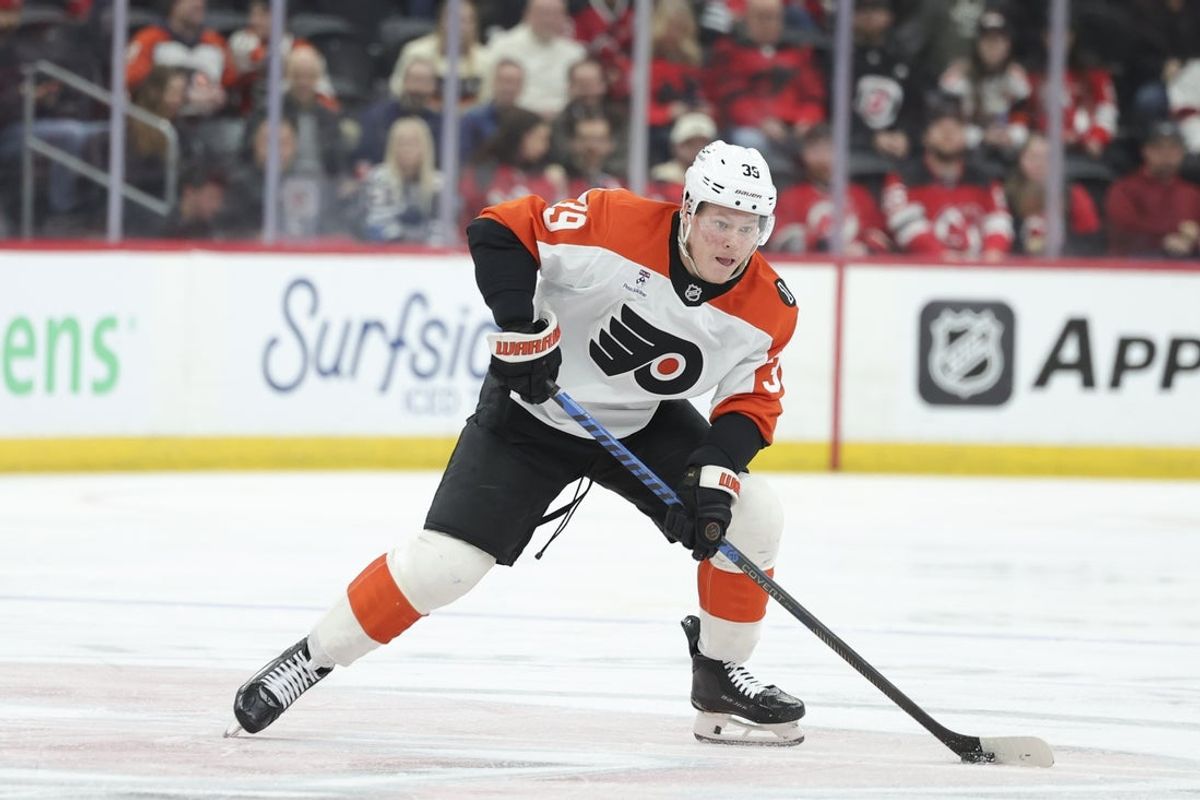 Apr 7, 2026; Newark, New Jersey, USA; Philadelphia Flyers right wing Matvei Michkov (39) skates with the puck against the New Jersey Devils during the first period at Prudential Center. Mandatory Credit: Luther Schlaifer-Imagn Images