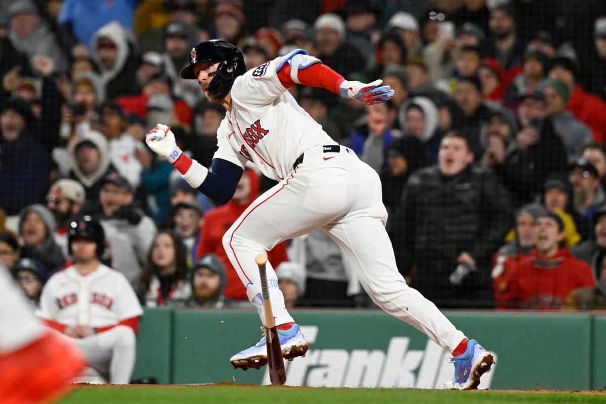 Apr 7, 2026; Boston, Massachusetts, USA; Boston Red Sox shortstop Trevor Story (10) hits a two run RBI double  during sixth inning against the Milwaukee Brewers at Fenway Park. Mandatory Credit: Eric Canha-Imagn Images