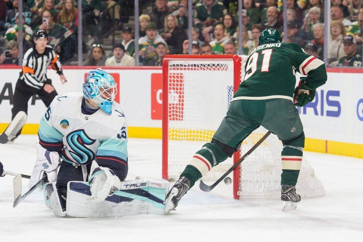 Apr 7, 2026; Saint Paul, Minnesota, USA; Minnesota Wild right wing Vladimir Tarasenko (91) scores on a Seattle Kraken goaltender Joey Daccord (35) rebound in the second period at Grand Casino Arena. Mandatory Credit: Matt Blewett-Imagn Images