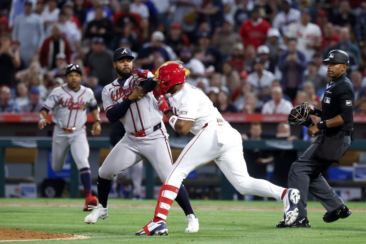 Apr 7, 2026; Anaheim, California, USA; A fight breaks out between Atlanta Braves pitcher Reynaldo López (40) and Los Angeles Angels right fielder Jorge Soler (12) during the fifth inning at Angel Stadium. Mandatory Credit: William Navarro-Imagn Images