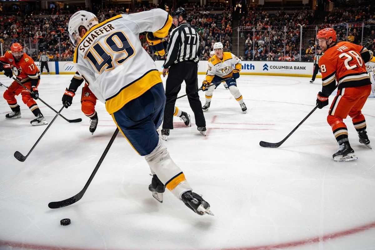 Apr 4, 2026; Anaheim, California, USA; Nashville Predators left wing Reid Schaefer (49) moves the puck following a face off during the second period against the Anaheim Ducks at Honda Center. Mandatory Credit: Corinne Votaw-Imagn Images