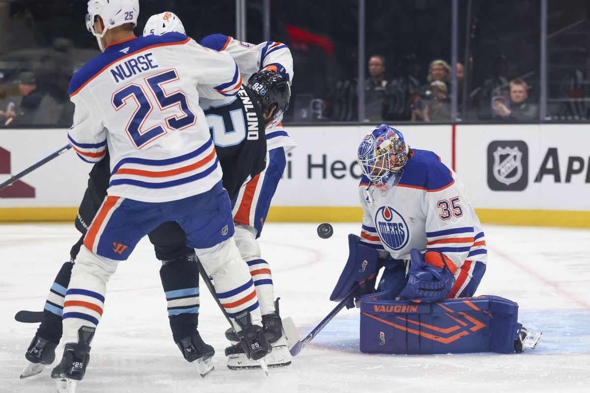 Apr 7, 2026; Salt Lake City, Utah, USA; Edmonton Oilers goaltender Tristan Jarry (35) blocks a shot by the Utah Mammoth during the third period at Delta Center. Mandatory Credit: Rob Gray-Imagn Images
