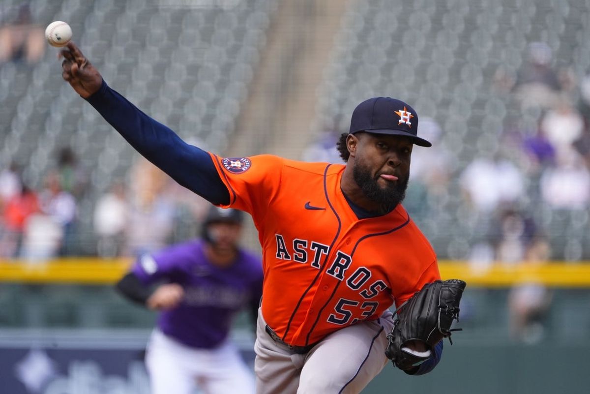 Apr 8, 2026; Denver, Colorado, USA; Houston Astros starting pitcher Cristian Javier (53) delivers a pitch in the first inning against the Colorado Rockies at Coors Field. Mandatory Credit: Ron Chenoy-Imagn Images