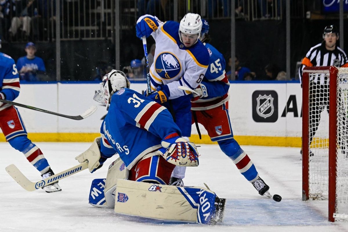 Apr 8, 2026; New York, New York, USA; Buffalo Sabres left wing Zach Benson (6) deflects the puck into the net past New York Rangers goaltender Igor Shesterkin (31) during the first period at Madison Square Garden. Mandatory Credit: Dennis Schneidler-Imagn Images