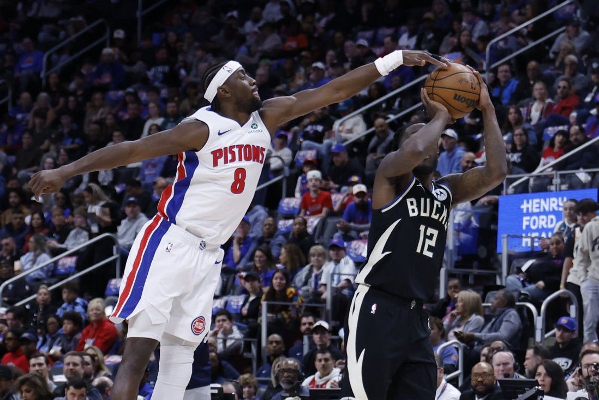 Apr 08, 2026; Detroit, Michigan, USA; Detroit Pistons forward Caris LeVert (8) defends Milwaukee Bucks forward Taurean Prince (12) in the first half at Little Caesars Arena. Mandatory Credit: Rick Osentoski-Imagn Images