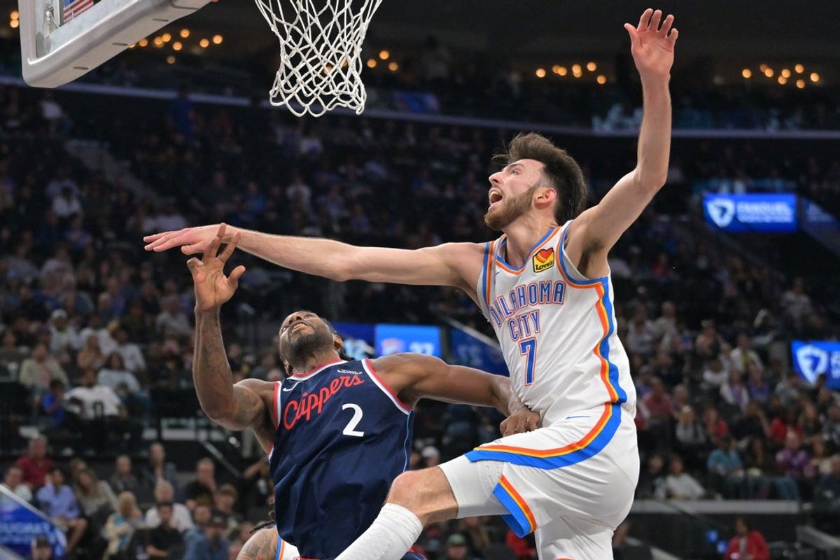 Apr 8, 2026; Inglewood, California, USA;  Oklahoma City Thunder guard Luguentz Dort (5) defends a shot by Los Angeles Clippers forward Kawhi Leonard (2) in the first half at Intuit Dome. Mandatory Credit: Jayne Kamin-Oncea-Imagn Images