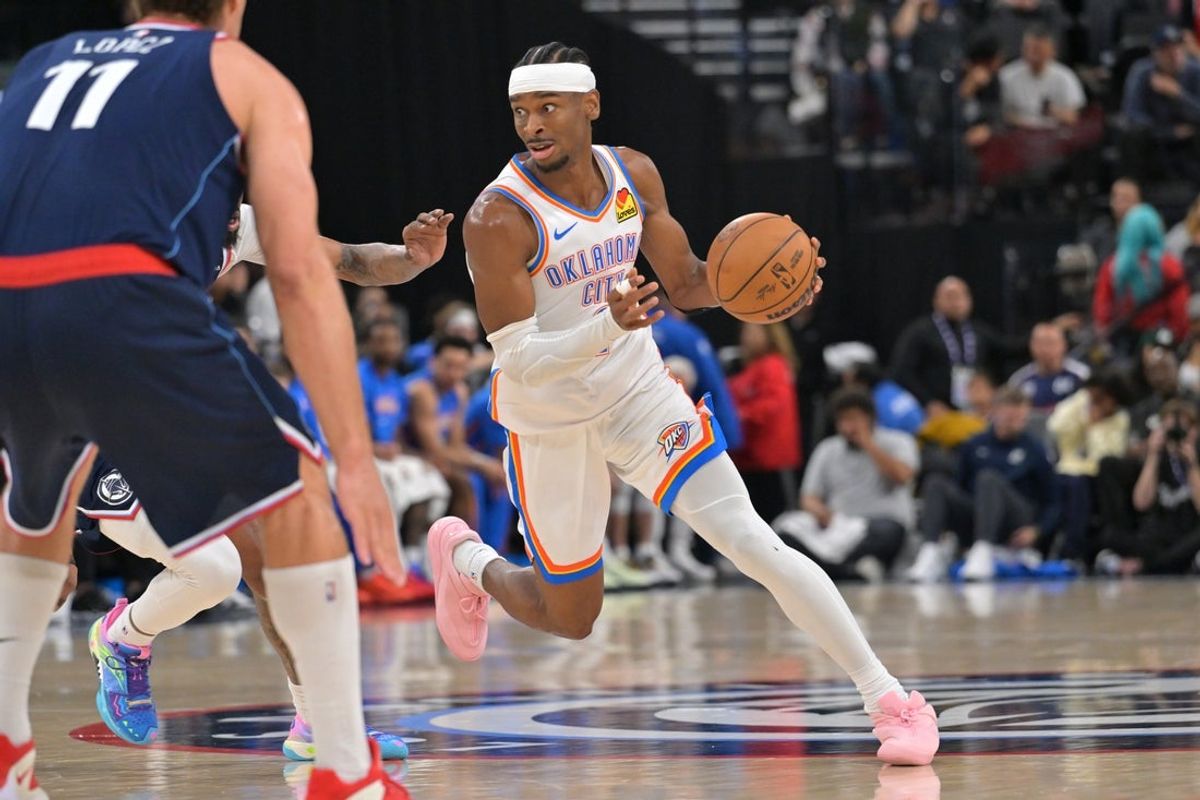 Apr 8, 2026; Inglewood, California, USA; Oklahoma City Thunder guard Shai Gilgeous-Alexander (2) is defended by Los Angeles Clippers center Brook Lopez (11) in the second half at Intuit Dome. Mandatory Credit: Jayne Kamin-Oncea-Imagn Images
