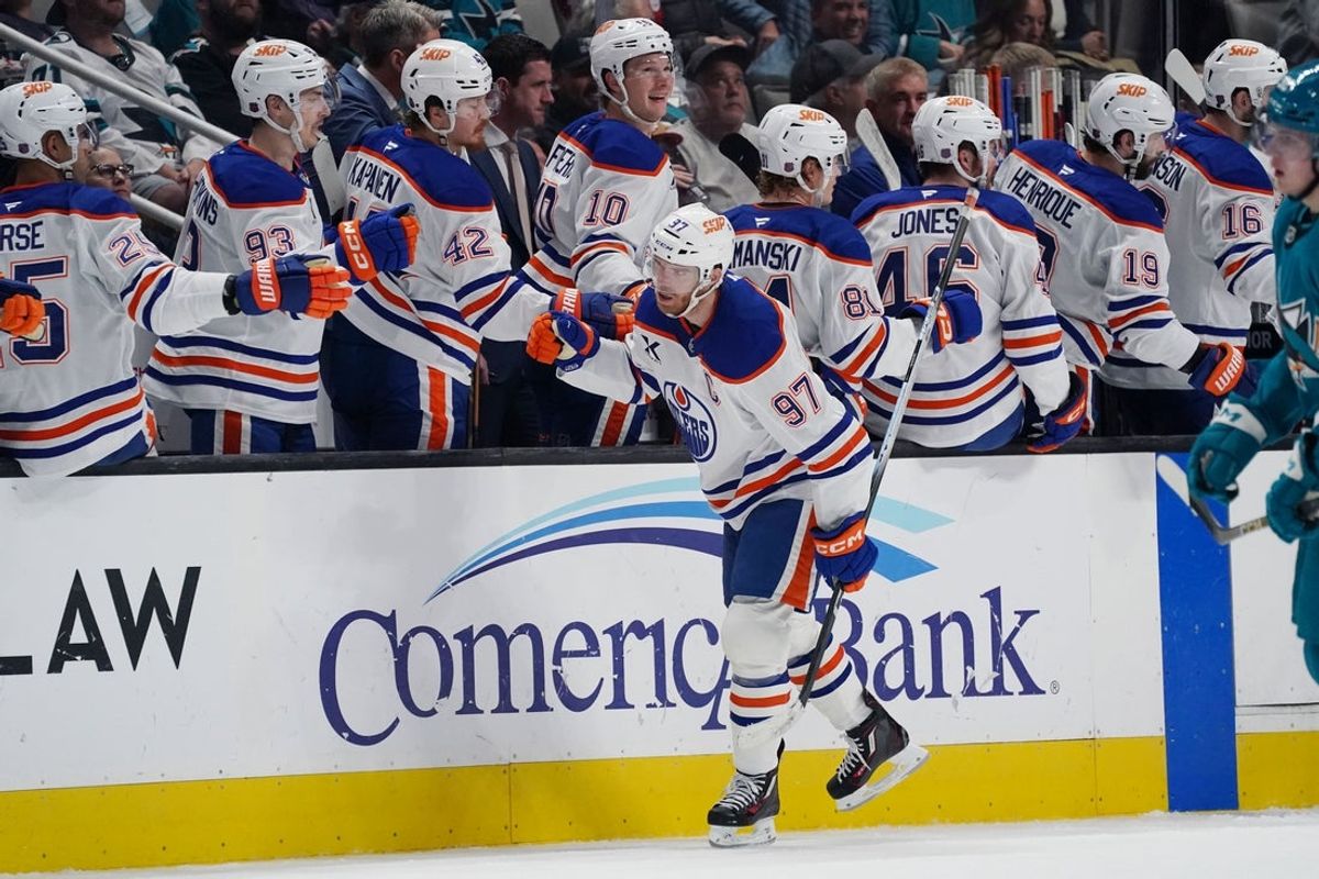 Apr 8, 2026; San Jose, California, USA;  Edmonton Oilers center Connor McDavid (97) is congratulated by the bench after scoring a goal in the second period at SAP Center at San Jose. Mandatory Credit: David Gonzales-Imagn Images