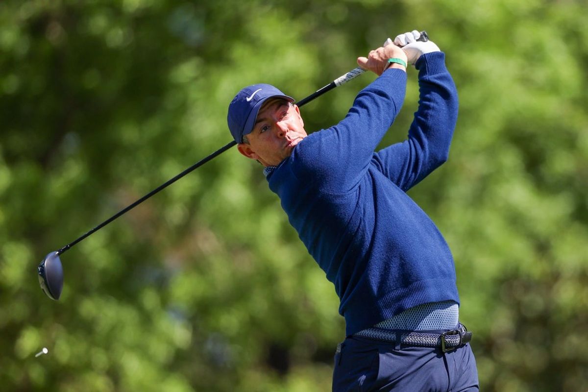 April 9, 2026; Augusta, Ga.; Rory McIlroy hits his tee shot on the fifth hole at Augusta National. Credit: Bill Streicher-Imagn Images