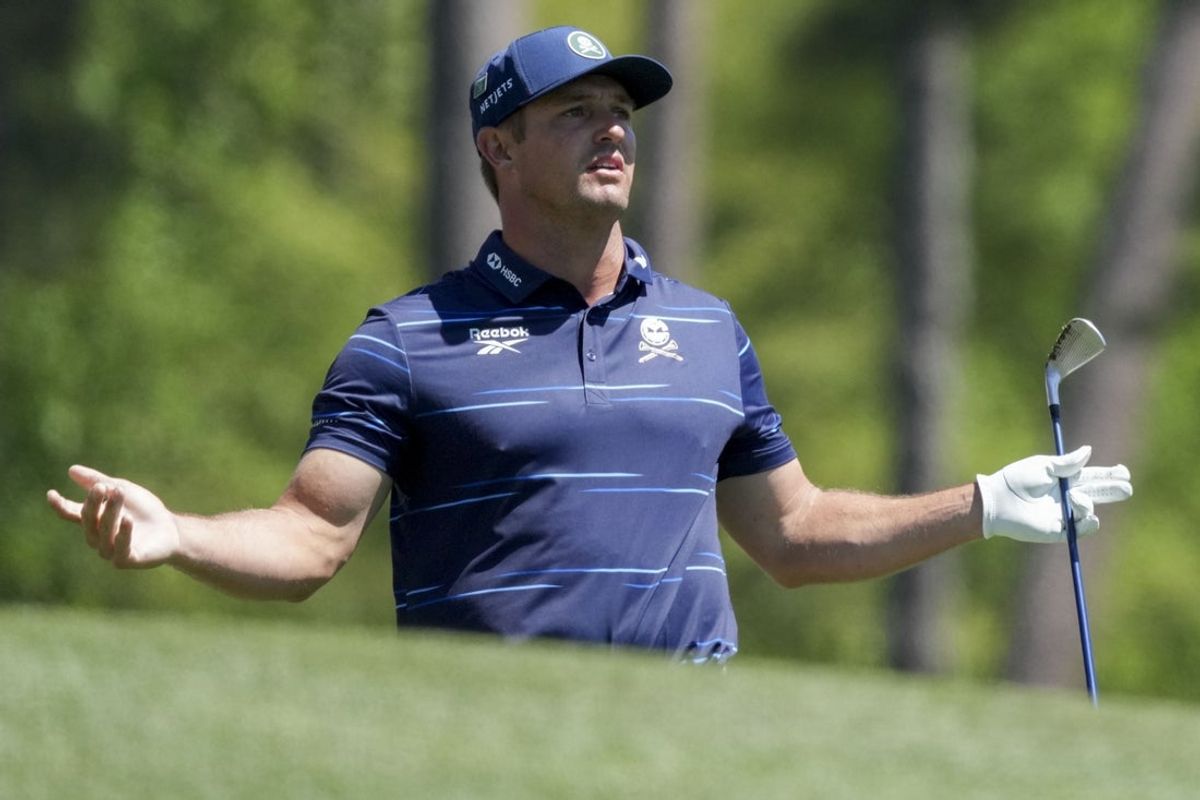 Apr 9, 2026; Augusta, Georgia, USA; Bryson DeChambeau reacts to his tee shot on the 12th hole during the first round of the Masters Tournament at Augusta National Golf Club. Mandatory Credit: Grace Smith-Imagn Images