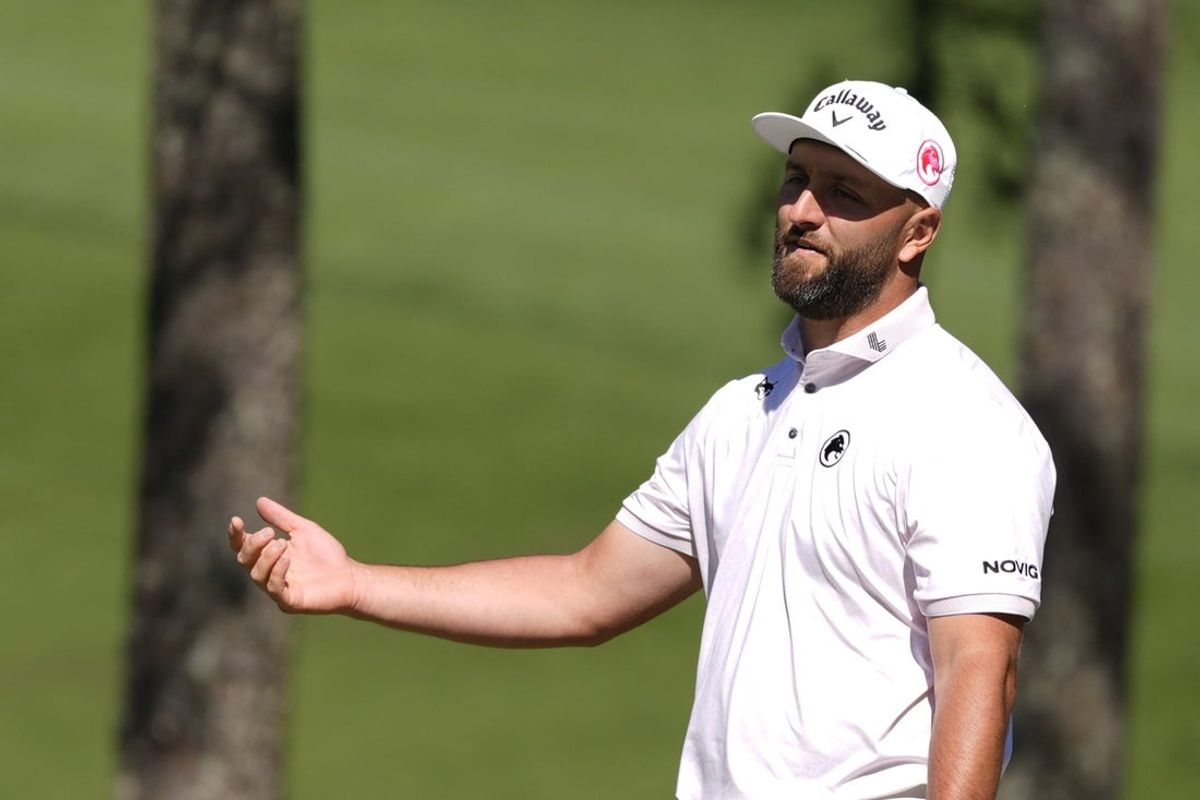 Apr 9, 2026; Augusta, Georgia, USA; Jon Rahm reacts after a putt on the 10th green during the first round of the Masters Tournament at Augusta National Golf Club. Mandatory Credit: Katie Goodale-Imagn Images