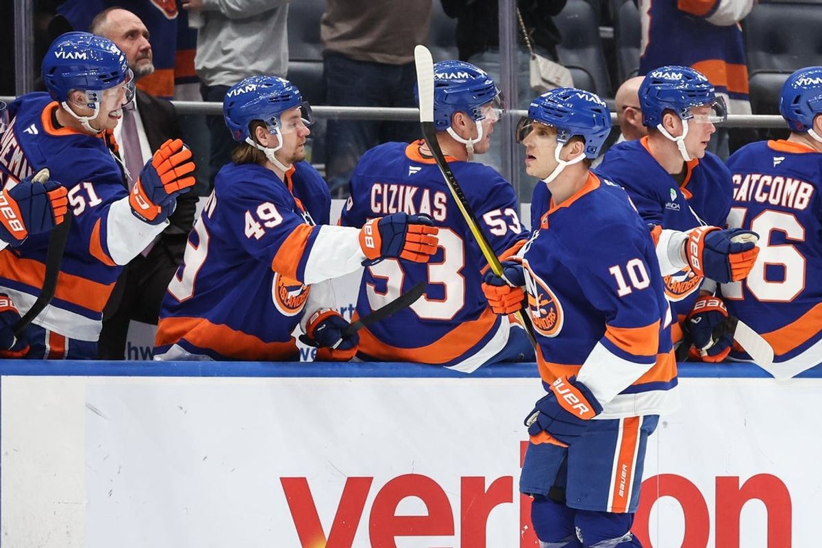 Apr 9, 2026; Elmont, New York, USA;  New York Islanders center Brayden Schenn (10) celebrates with teammates after scoring a goal in the first period against the Toronto Maple Leafs at UBS Arena. Mandatory Credit: Wendell Cruz-Imagn Images
