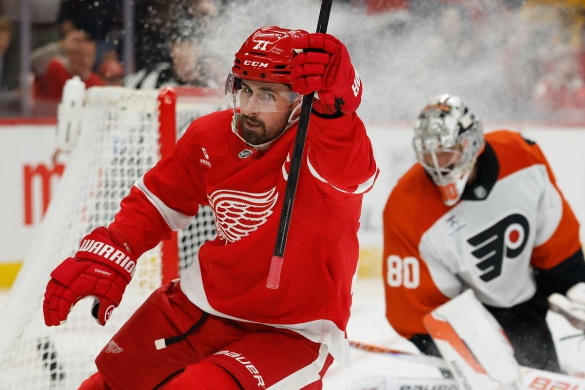 Mar 28, 2026; Detroit, Michigan, USA;  Detroit Red Wings center Dylan Larkin (71) celebrates after scoring on Philadelphia Flyers goaltender Dan Vladar (80) in the second period at Little Caesars Arena. Mandatory Credit: Rick Osentoski-Imagn Images