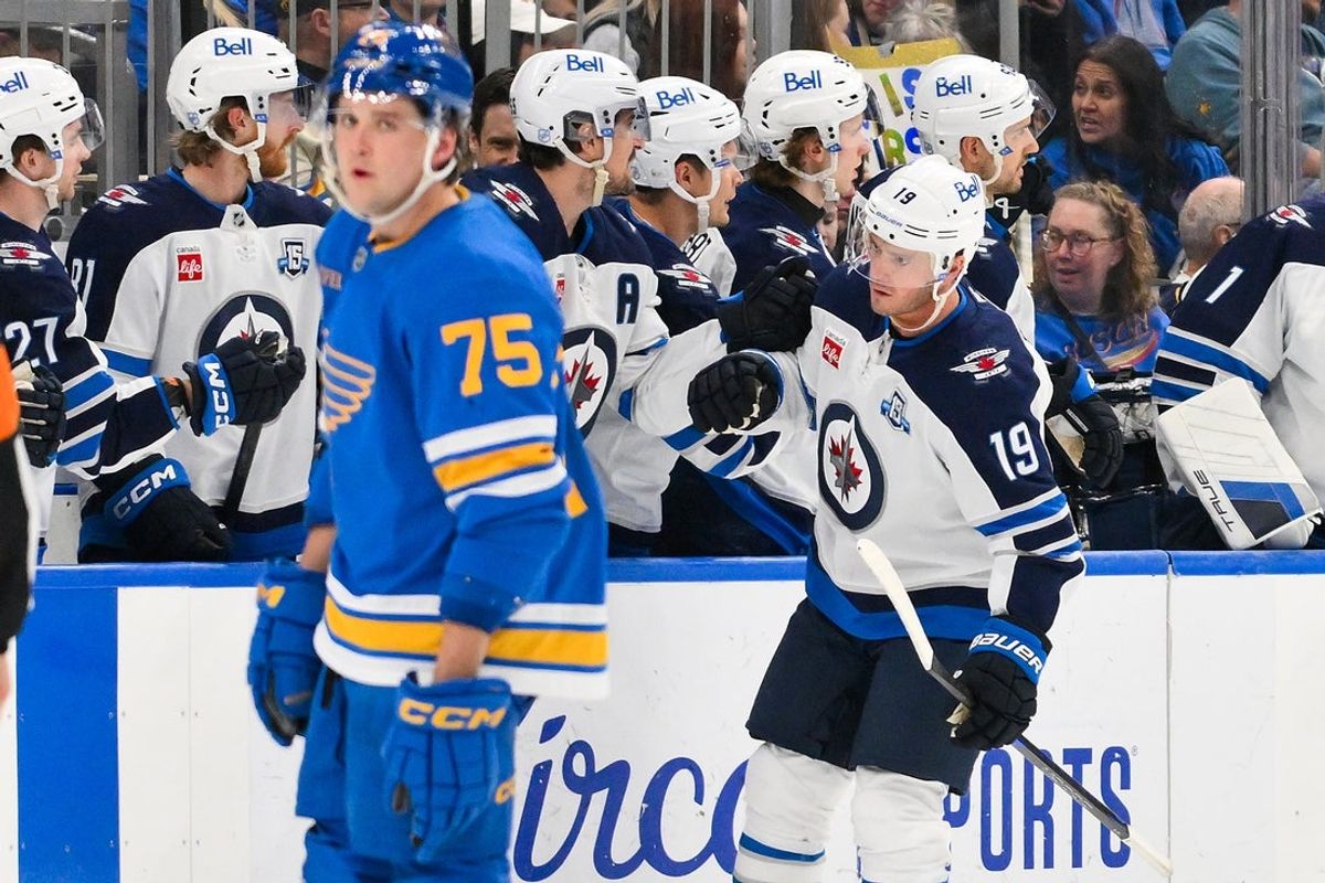 Apr 9, 2026; St. Louis, Missouri, USA; Winnipeg Jets center Jonathan Toews (19) is congratulated by teammates after scoring against the St. Louis Blues during the second period at Enterprise Center. Mandatory Credit: Jeff Curry-Imagn Images