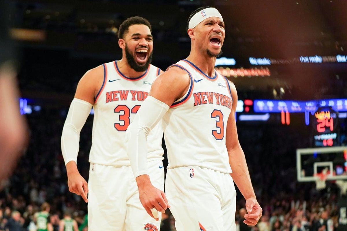 Apr 9, 2026; New York, New York, USA; New York Knicks center Karl-Anthony Towns (32) celebrates with New York Knicks guard Josh Hart (3) after Hart hit a three pointer late in the fourth quarter against the Boston Celtics at Madison Square Garden. Mandatory Credit: Lucas Boland-Imagn Images