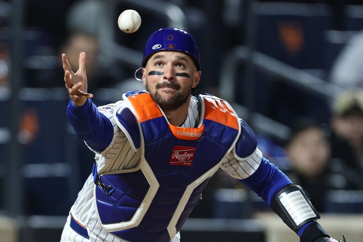 Apr 9, 2026; New York City, New York, USA; New York Mets catcher Luis Torrens (13) reaches for the ball during the seventh inning against the Arizona Diamondbacks at Citi Field. Mandatory Credit: Vincent Carchietta-Imagn Images