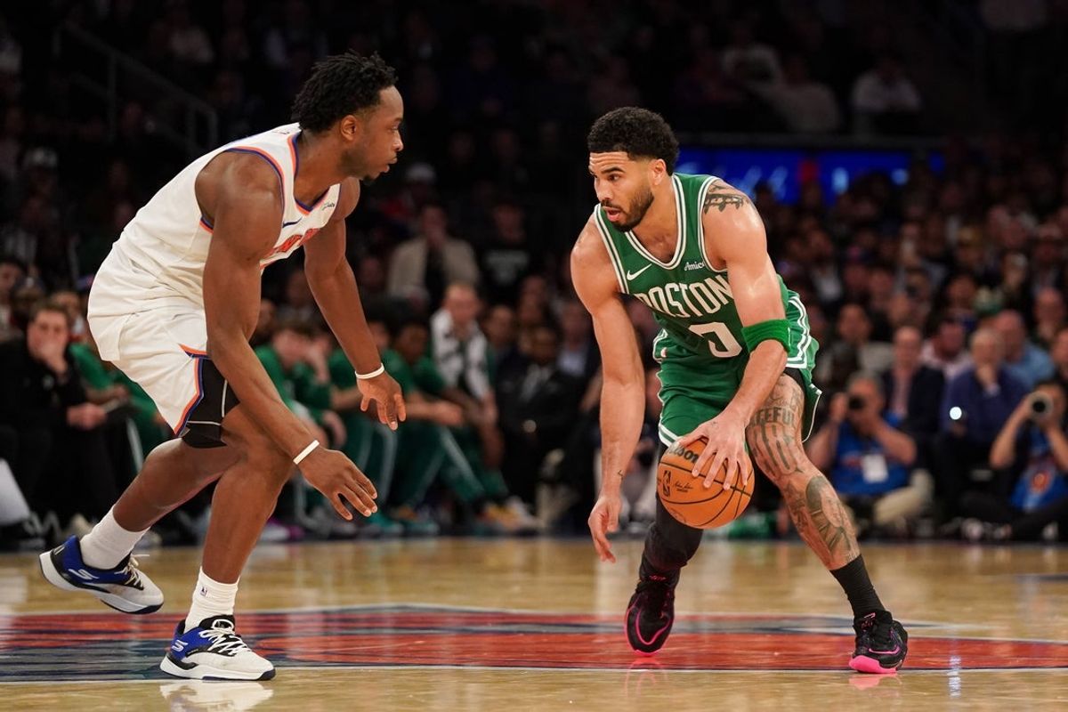 Apr 9, 2026; New York, New York, USA; New York Knicks forward OG Anunoby (8) defends Boston Celtics forward Jayson Tatum (0) during the fourth quarter at Madison Square Garden. Mandatory Credit: Lucas Boland-Imagn Images