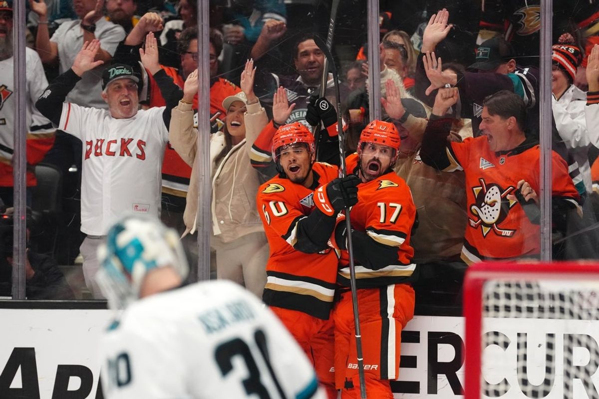 Apr 9, 2026; Anaheim, California, USA; Anaheim Ducks defenseman Tyson Hinds (60) celebrates with left wing Alex Killorn (17) after scoring a goal against San Jose Sharks goaltender Yaroslav Askarov (30) in the second period at Honda Center. Mandatory Credit: Kirby Lee-Imagn Images
