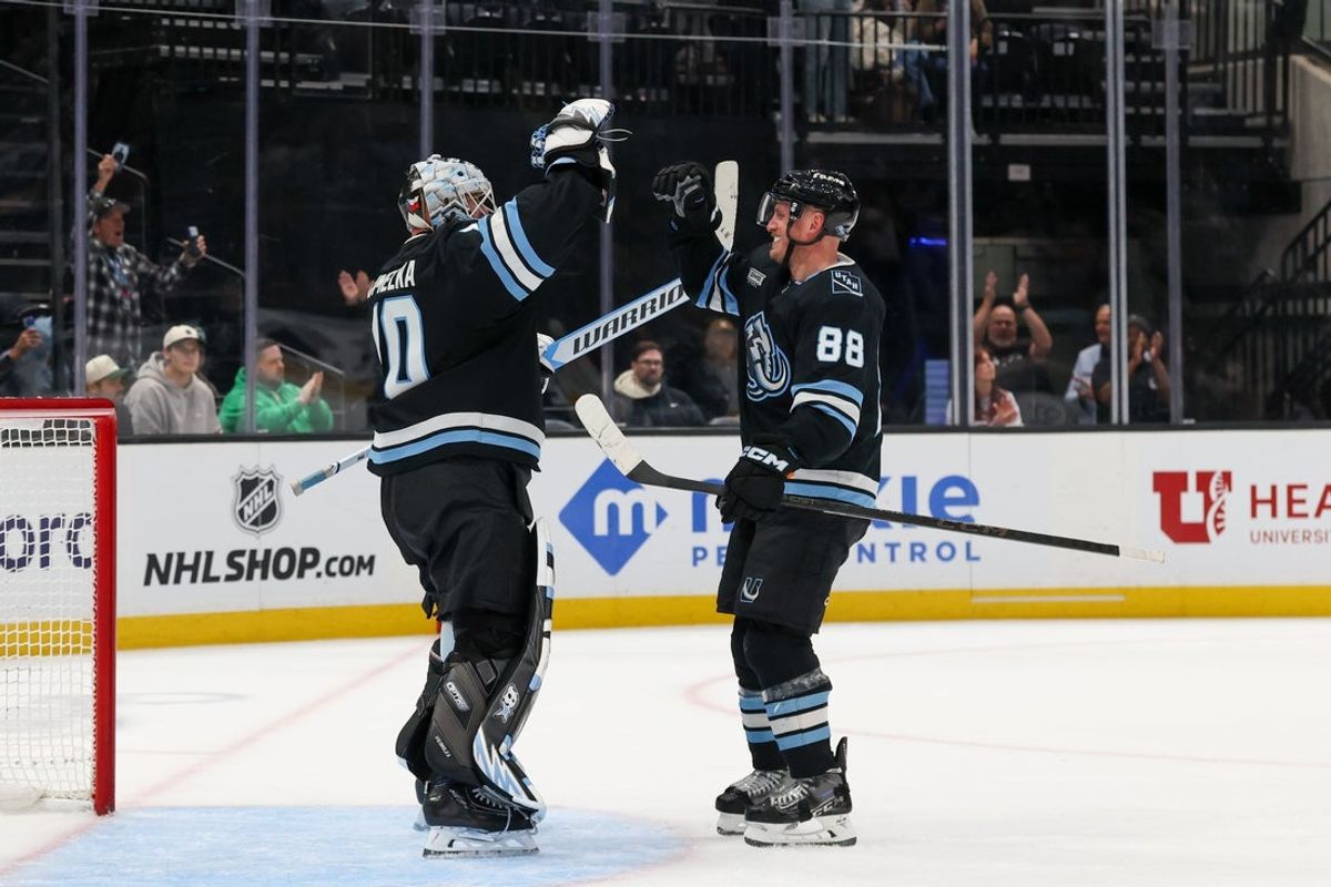 Apr 9, 2026; Salt Lake City, Utah, USA; Utah Mammoth goaltender Karel Vejmelka (70) celebrates with defenseman Nate Schmidt (88) after defeating the Nashville Predators in the third period at Delta Center. Mandatory Credit: Rob Gray-Imagn Images
