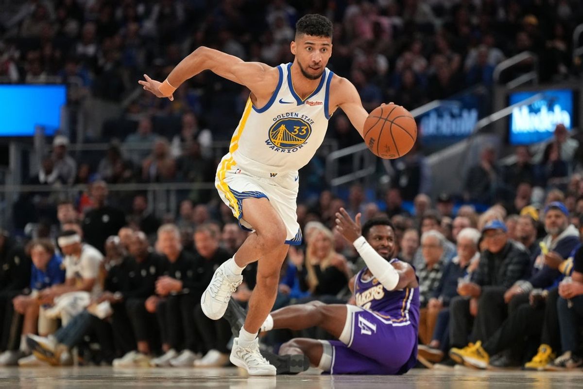 Apr 9, 2026; San Francisco, California, USA; Golden State Warriors forward Malevy Leons (33) steals the ball from Los Angeles Lakers guard Bronny James (9) in the third quarter at the Chase Center. Mandatory Credit: Cary Edmondson-Imagn Images