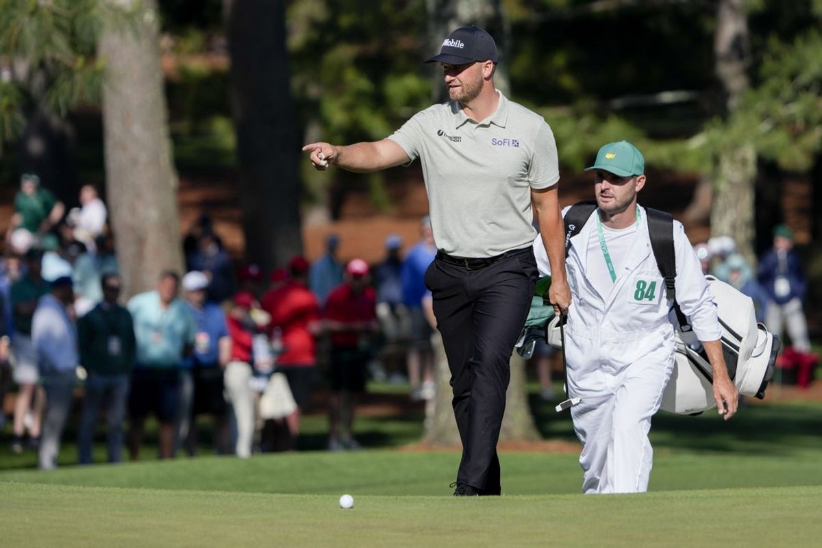 Apr 10, 2026; Augusta, Georgia, USA; Wyndham Clark walks onto the seventh green during the second round of the Masters Tournament at Augusta National Golf Club. Mandatory Credit: Kyle Terada-Imagn Images