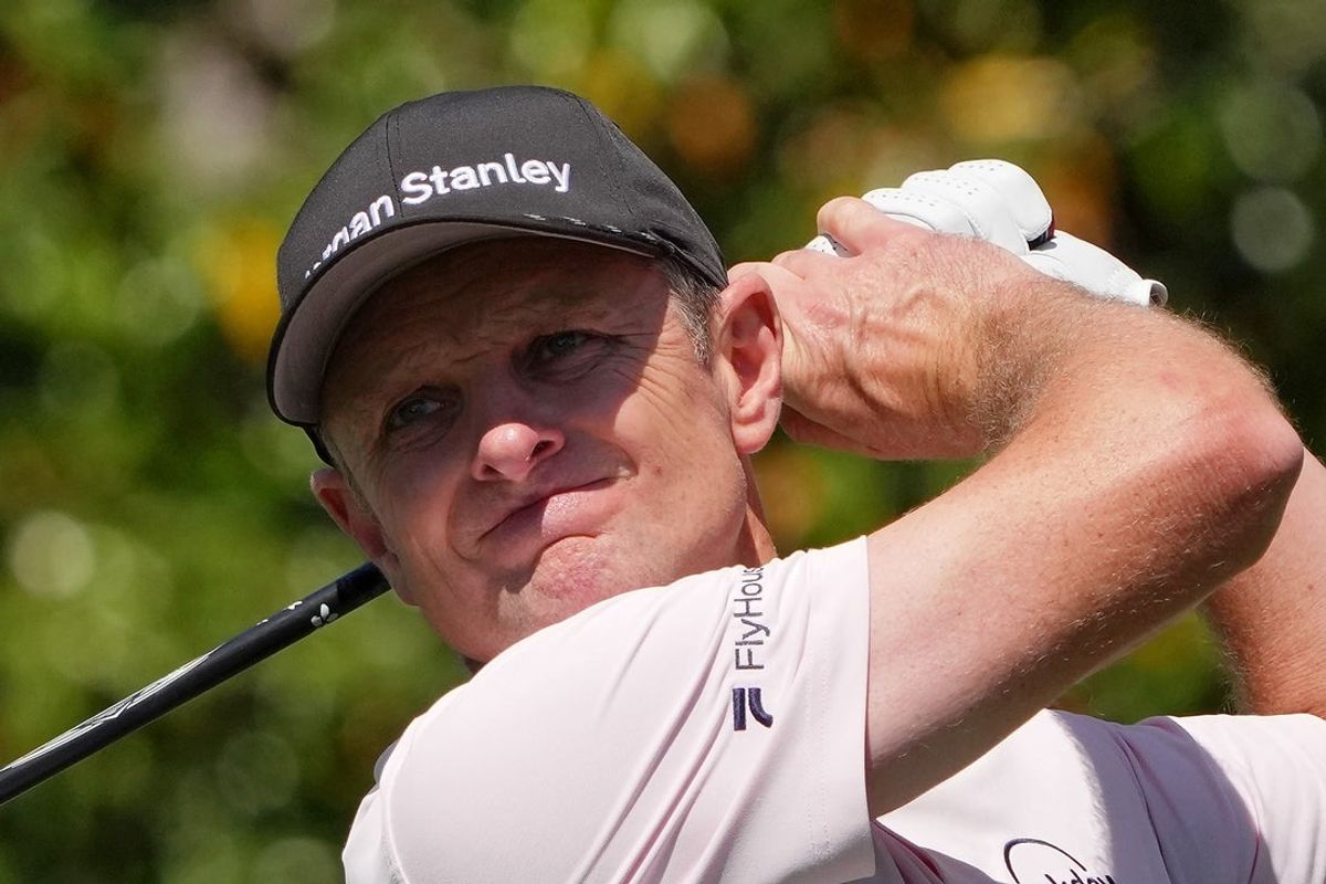 Apr 10, 2026; Augusta, Georgia, USA; Justin Rose tees off on the ninth hole during the second round of the Masters Tournament at Augusta National Golf Club. Mandatory Credit: Michael Madrid-Imagn Images