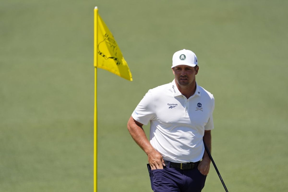 Apr 10, 2026; Augusta, Georgia, USA; Bryson DeChambeau looks on from the second green during the second round of the Masters Tournament at Augusta National Golf Club. Mandatory Credit: Katie Goodale-Imagn Images