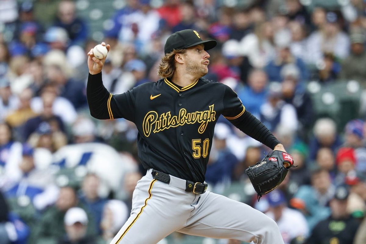 Apr 10, 2026; Chicago, Illinois, USA; Pittsburgh Pirates starting pitcher Carmen Mlodzinski (50) delivers a pitch against the Chicago Cubs during the second inning at Wrigley Field. Mandatory Credit: Kamil Krzaczynski-Imagn Images