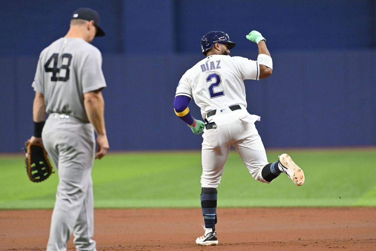 Apr 10, 2026; St. Petersburg, Florida, USA; Tampa Bay Rays infielder Yandy Diaz (2) reacts after hitting a two-run home run during the first inning against New York Yankees at Tropicana Field. Mandatory Credit: Pablo Robles-Imagn Images