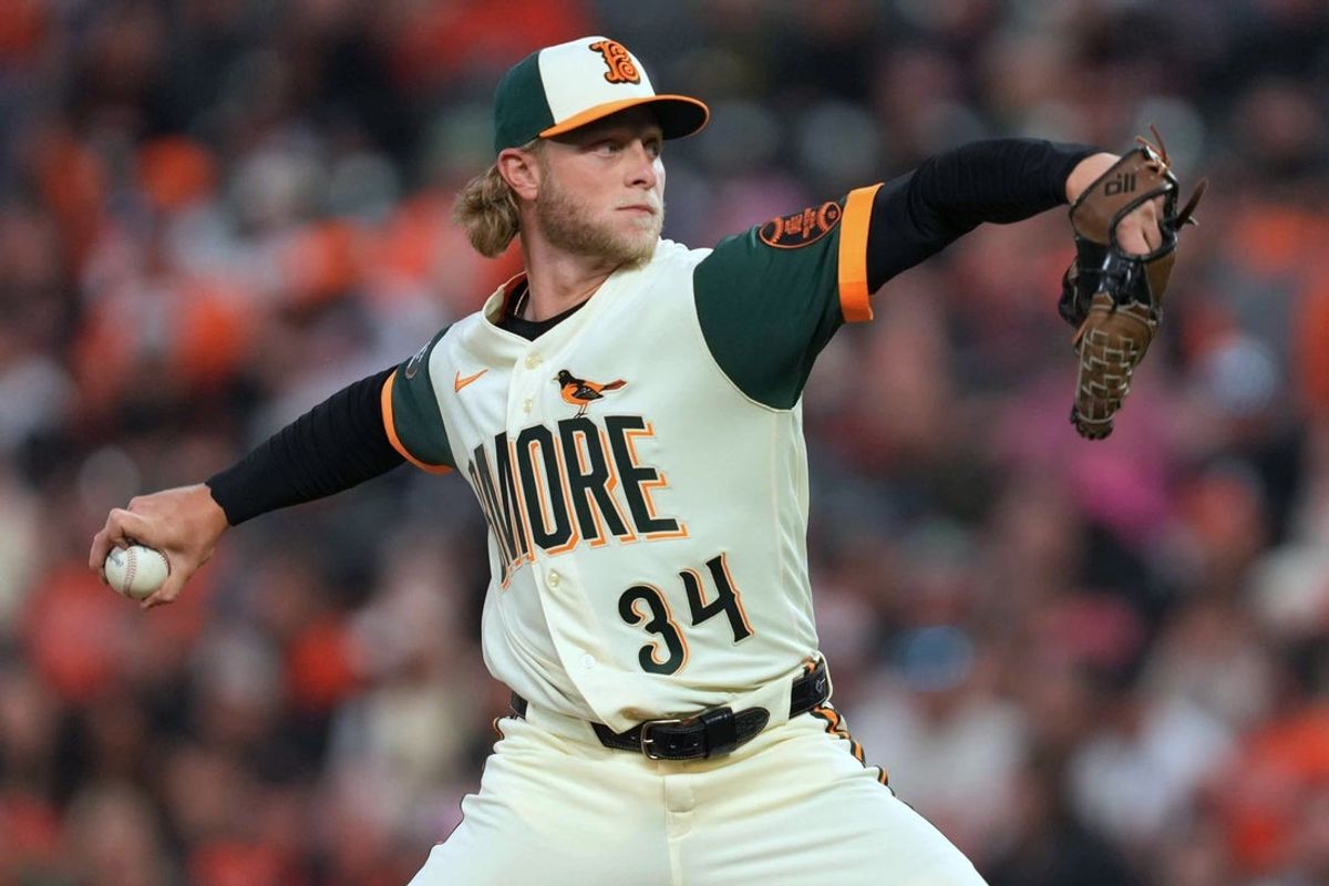 Apr 10, 2026; Baltimore, Maryland, USA;  Baltimore Orioles pitcher Shane Baz (34) delivers during the second inning against the San Francisco Giants at Oriole Park at Camden Yards. Mandatory Credit: Mitch Stringer-Imagn Images