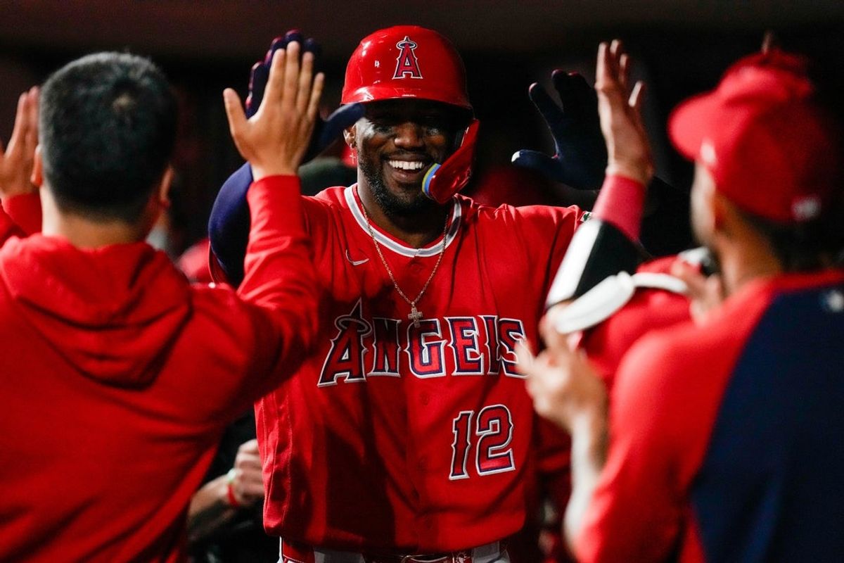 Los Angeles Angels designated hitter Jorge Soler (12) celebrates after hitting a grand slam in the eighth inning of the MLB Interleague game between the Cincinnati Reds and the Los Angeles Angels at Great American Ball Park in downtown Cincinnati on Friday, April 10, 2026. The Angels won 10-2.