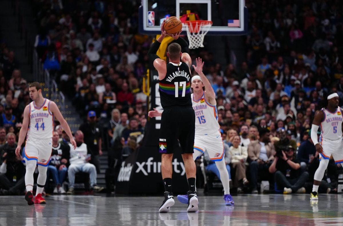 Apr 10, 2026; Denver, Colorado, USA; Denver Nuggets center Jonas Valanciunas (17) lines up a three point basket attempt in the second quarter against the Oklahoma City Thunder at Ball Arena. Mandatory Credit: Ron Chenoy-Imagn Images