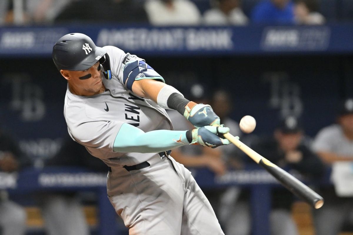 Apr 10, 2026; St. Petersburg, Florida, USA; New York Yankees outfielder Aaron Judge (99) hits a foul ball during the fifth inning abasing Tampa Bay Rays at Tropicana Field. Mandatory Credit: Pablo Robles-Imagn Images