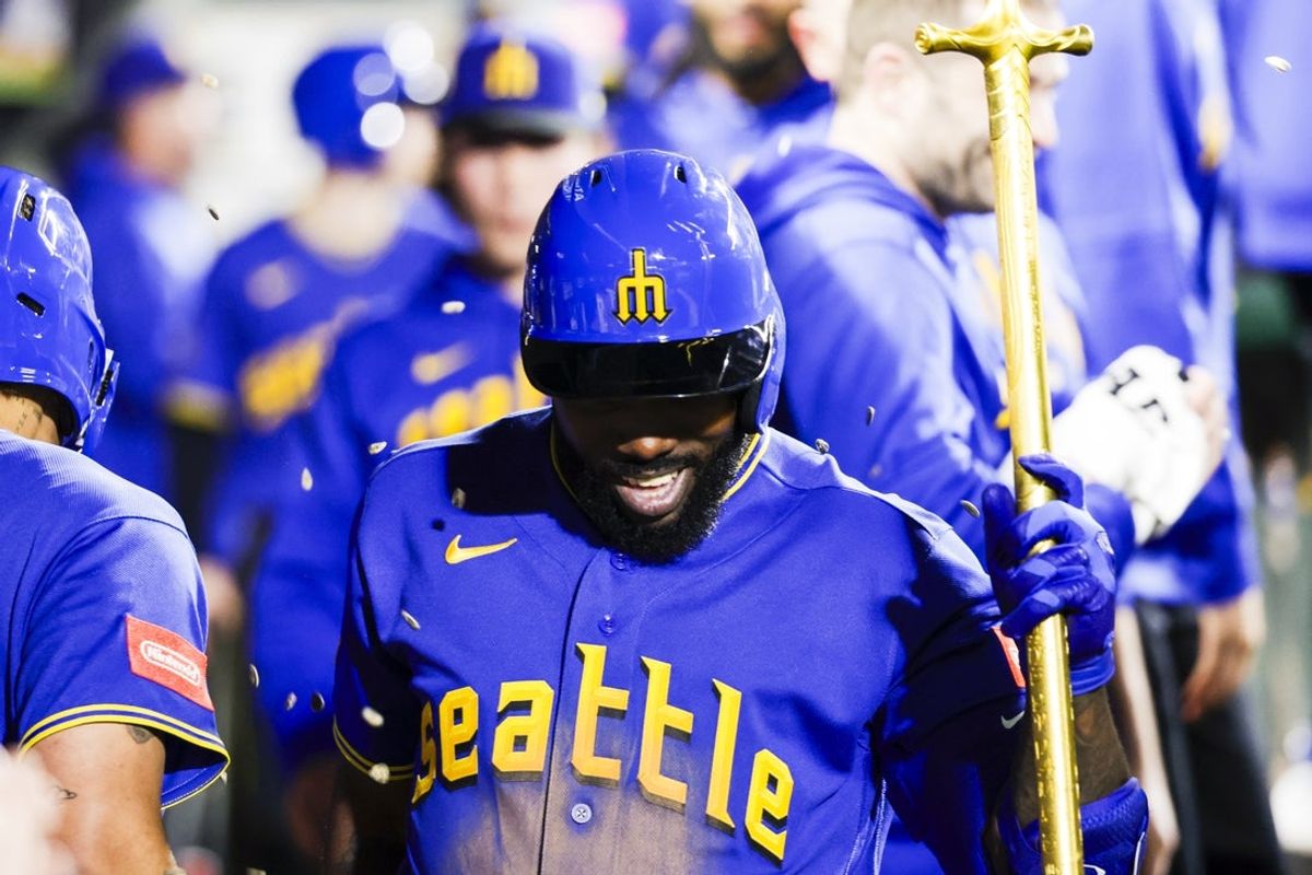 Apr 10, 2026; Seattle, Washington, USA; Seattle Mariners left fielder Randy Arozarena (56) celebrates in the dugout after hitting a two-run home run against the Houston Astros during the fifth inning at T-Mobile Park. Mandatory Credit: Joe Nicholson-Imagn Images