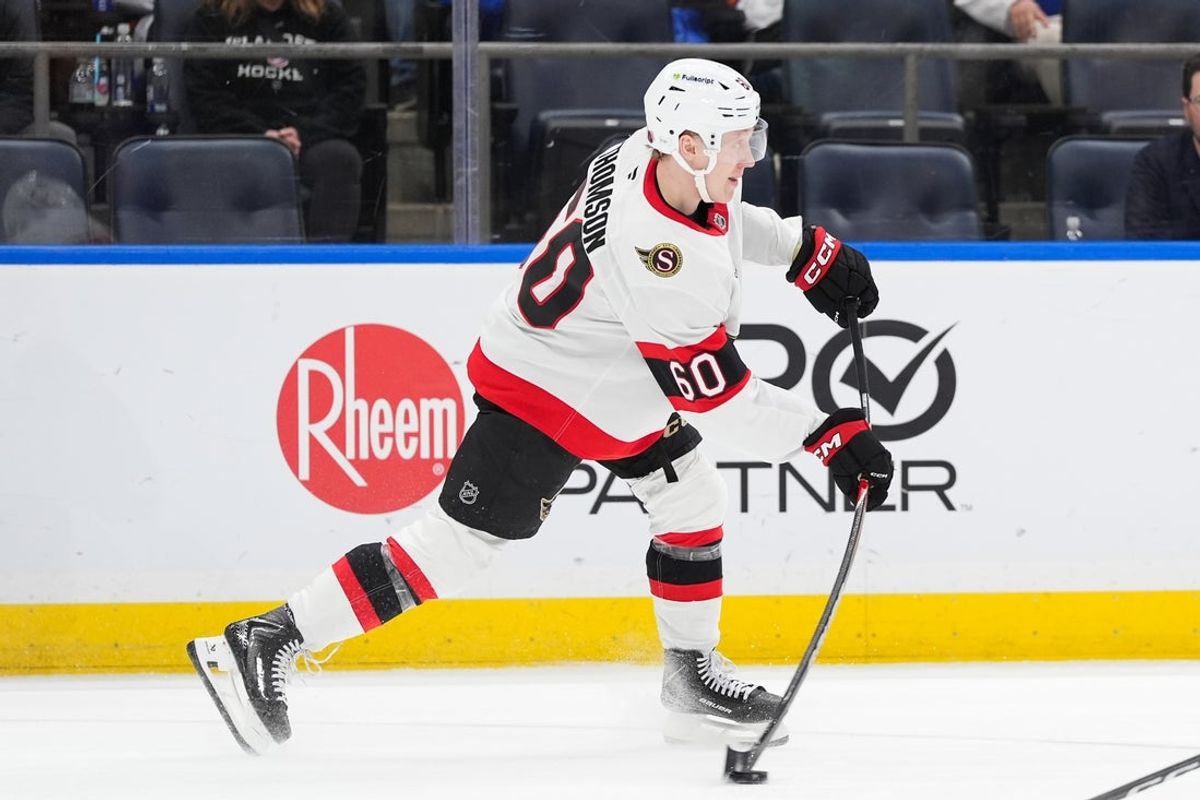 Apr 11, 2026; Elmont, New York, USA; Ottawa Senators defenseman Lassi Thomson (60) passes the puck in the second period at UBS Arena. Mandatory Credit: Alexander Wohl-Imagn Images