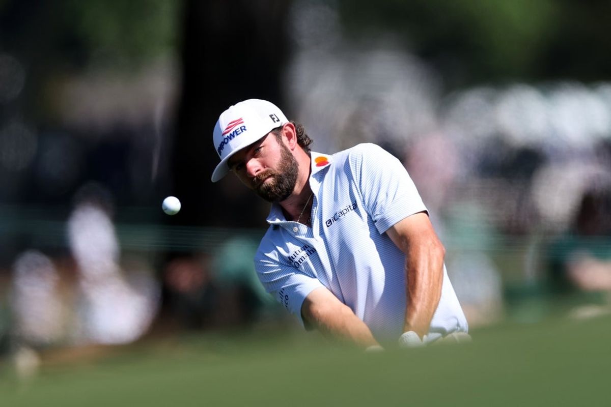 Apr 11, 2026; Augusta, Georgia, USA; Cameron Young chips onto the sixth green during the third round of the Masters Tournament at Augusta National Golf Club. Mandatory Credit: Bill Streicher-Imagn Images