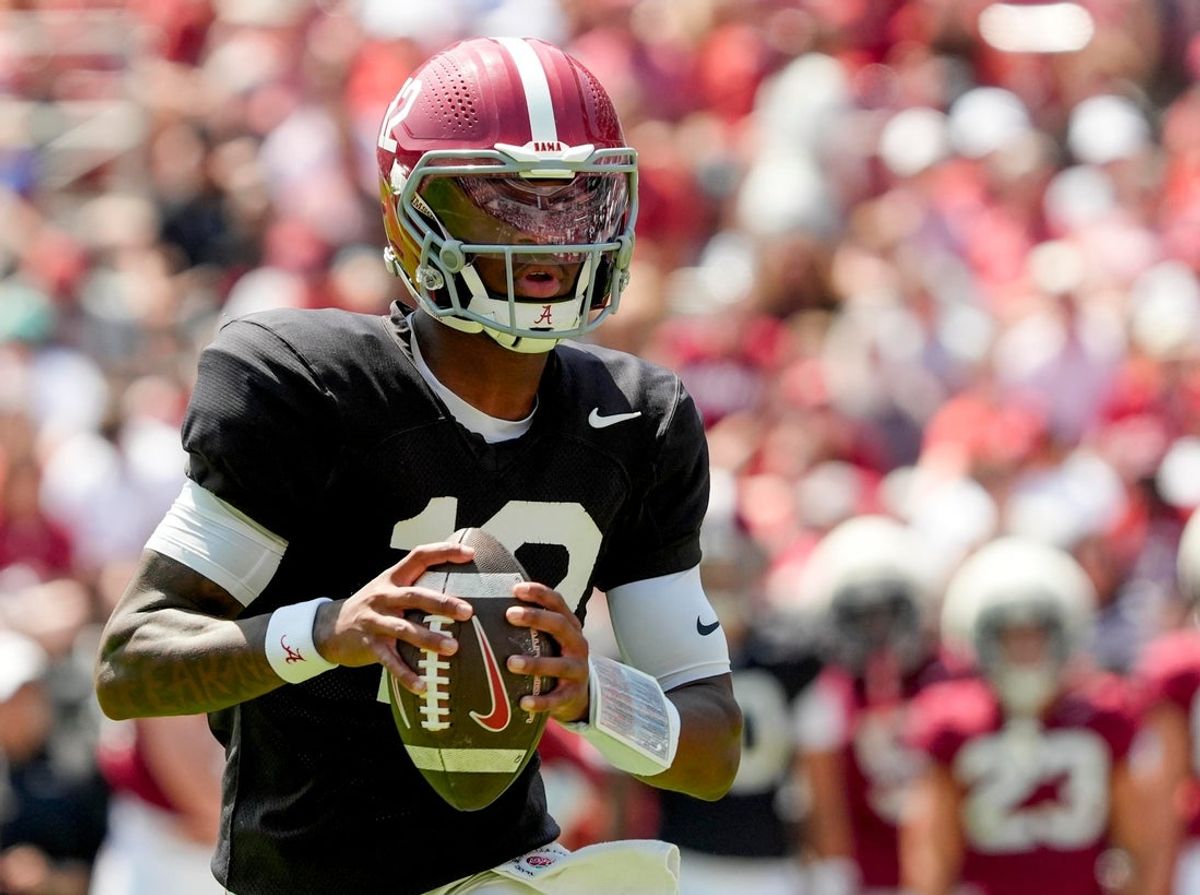 April 11, 2026; Tuscaloosa, AL, USA; Alabama quarterback Keelon Russell rolls out and throws a touchdown pass at Bryant-Denny Stadium during the Alabama A Day scrimmage.