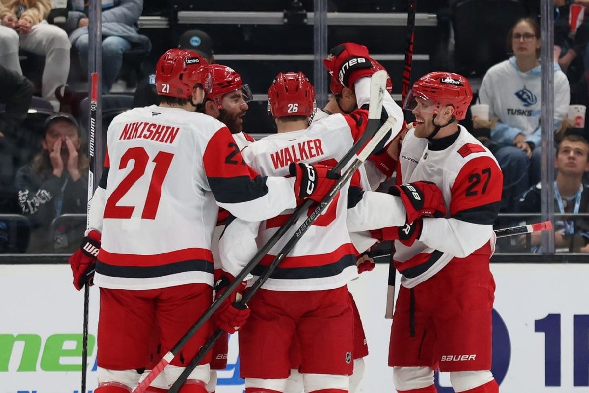 Apr 11, 2026; Salt Lake City, Utah, USA; Carolina Hurricanes center Jordan Staal (11) celebrates with teammates after scoring a goal against the Utah Mammoth during the first period at Delta Center. Mandatory Credit: Rob Gray-Imagn Images