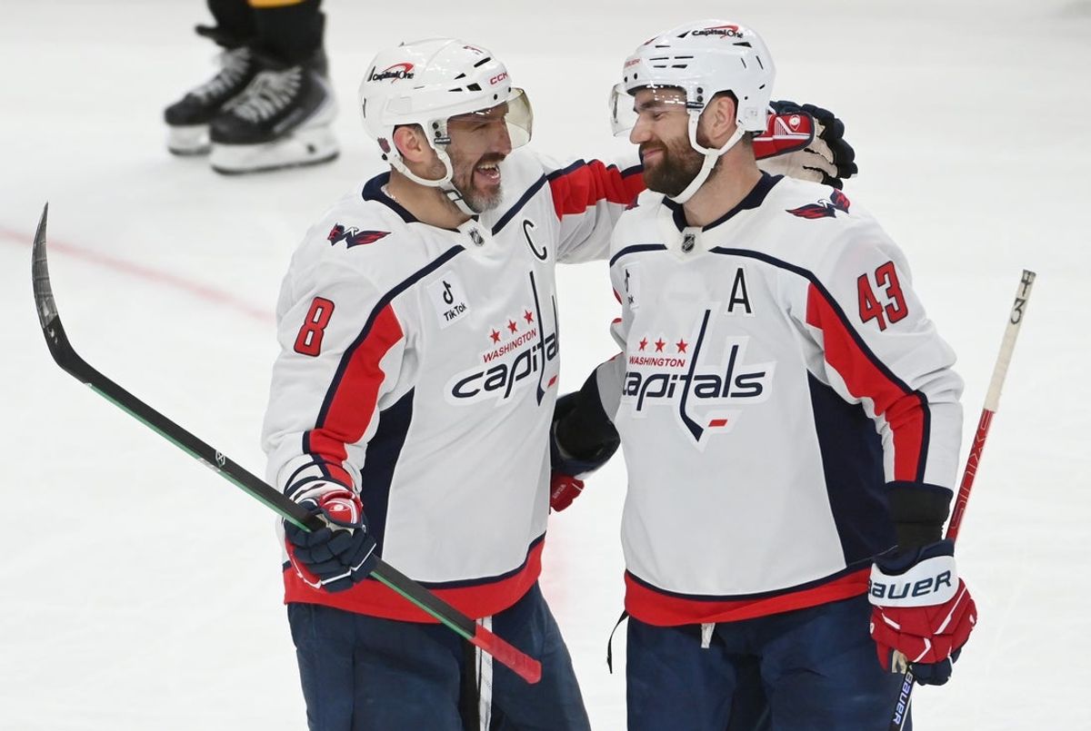Apr 11, 2026; Pittsburgh, Pennsylvania, USA;  Washington Capitals left wing Alex Ovechkin (8) celebrates an empty net goal against the Pittsburgh Penguins with right wing Tom Wilson (43) during the third period at PPG Paints Arena. Mandatory Credit: Philip G. Pavely-Imagn Images