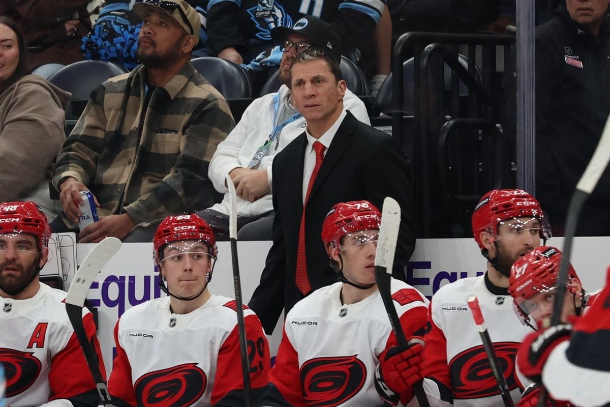 Apr 11, 2026; Salt Lake City, Utah, USA; Carolina Hurricanes head coach Rod Brind'Amour watches play against the Utah Mammoth during the third period at Delta Center. Mandatory Credit: Rob Gray-Imagn Images