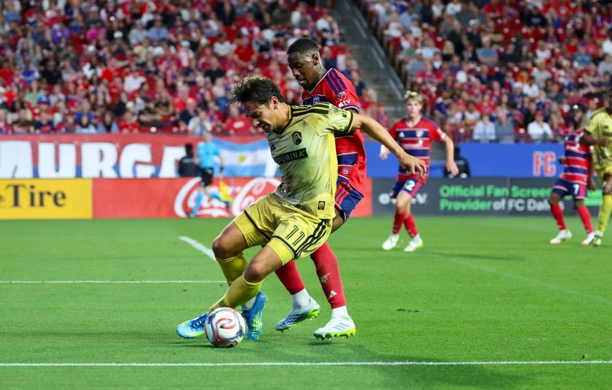 Apr 11, 2026; Frisco, Texas, USA;  St. Louis CITY SC forward Simon Becher (11) dribbles the ball as FC Dallas defender Osaze Urhoghide (3) defends during the first half at Toyota Stadium. Mandatory Credit: Kevin Jairaj-Imagn Images