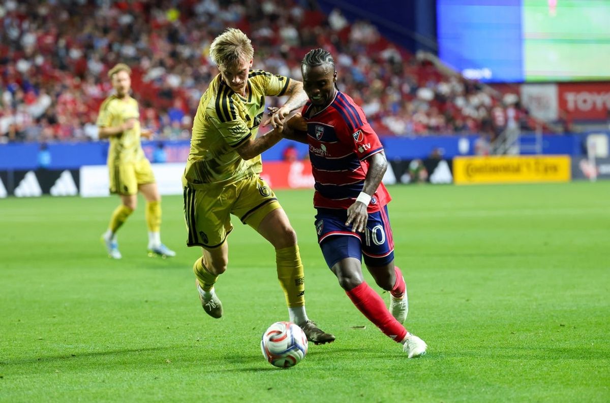 Apr 11, 2026; Frisco, Texas, USA;  FC Dallas forward Santiago Moreno (10) dribbles the ball as St. Louis CITY SC midfielder Conrad Wallem (6) defends during the second half at Toyota Stadium. Mandatory Credit: Kevin Jairaj-Imagn Images
