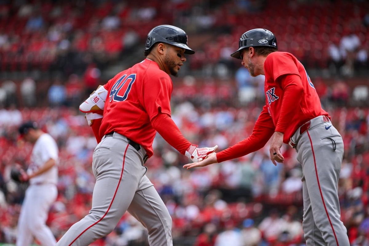Apr 12, 2026; St. Louis, Missouri, USA; Boston Red Sox first baseman Willson Contreras (40) is congratulated by third base coach Kyle Hudson (84) after hitting a two run home run against the St. Louis Cardinals during the first inning at Busch Stadium. Mandatory Credit: Jeff Curry-Imagn Images
